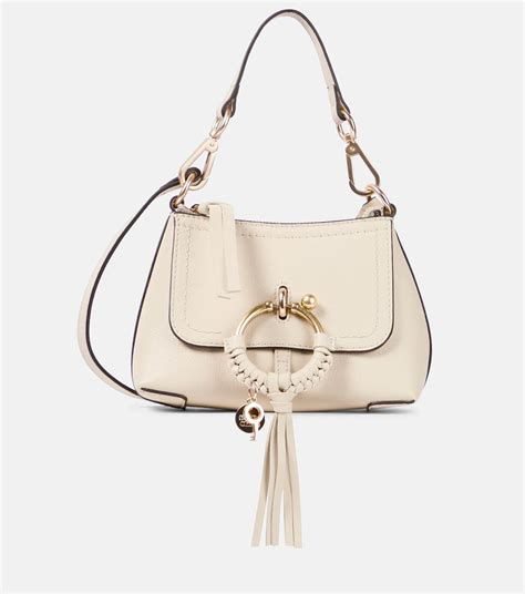 Joan Mini leather shoulder bag in beige 